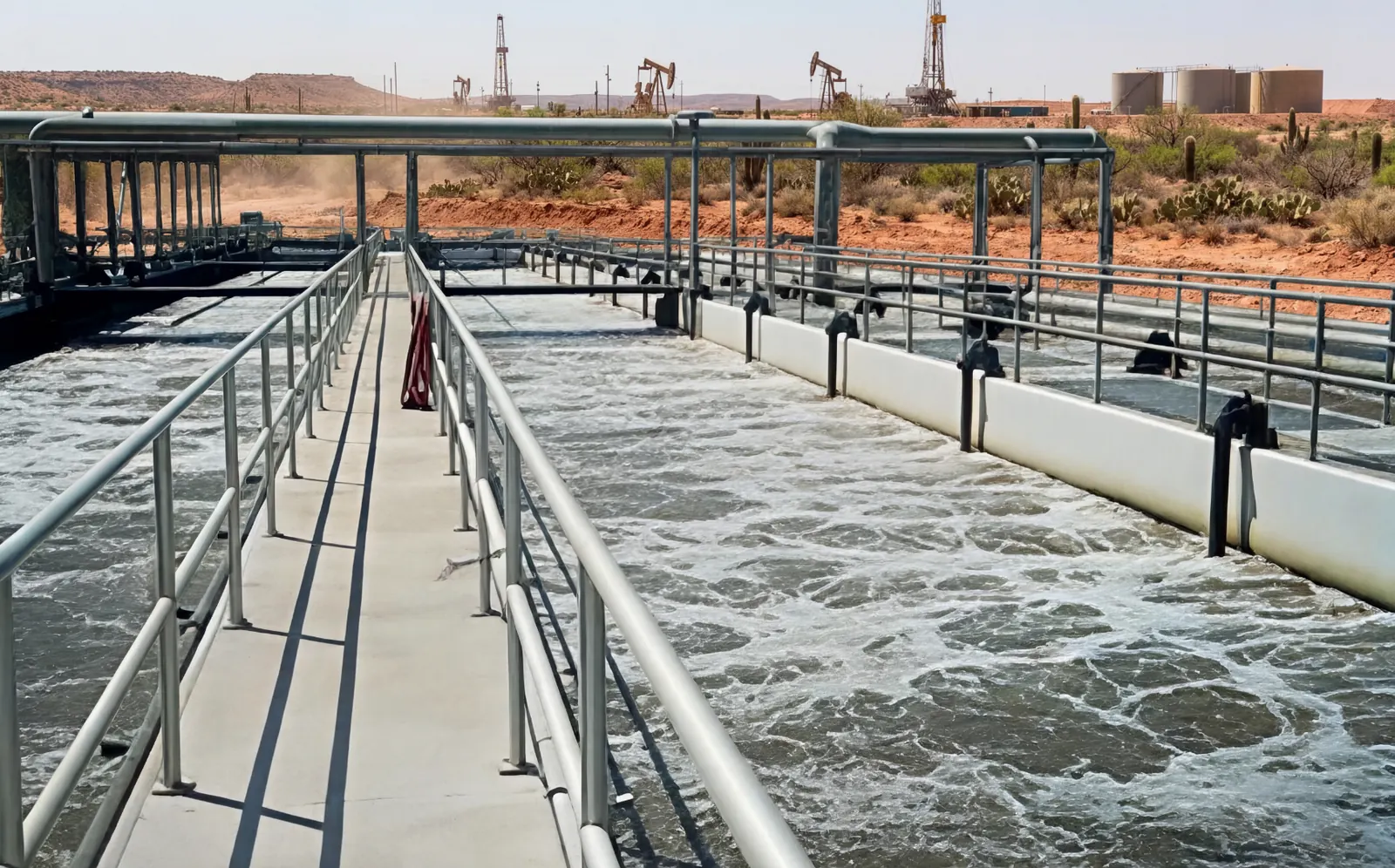 Water treatment and aeration basins with operating walkways